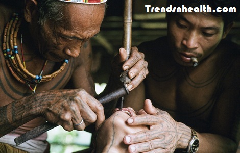 Chiseling teeth to get sharpened teeth is tradition, weird, bizzarre traditions