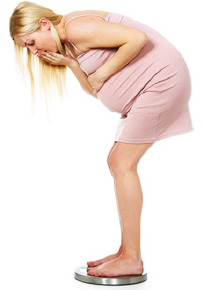 pregnant-woman-on-scale, pregnant weight gain stress